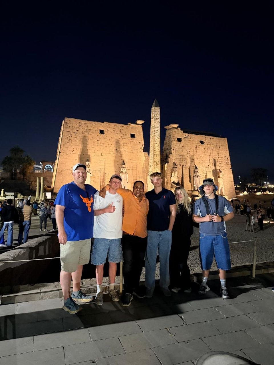 Whispers Egypt guide with travelers at an ancient site